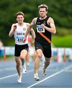 3 August 2025; Niall Carney of Clonliffe Harriers AC, Dublin, right, on his way to winning the senior men's 400m hurdles final ahead of Briain Cullinan of Sligo AC, left, who finished second, during day two of the 153rd 123.ie National Track & Field Senior Championships at Morton Stadium in Dublin. Photo by Sam Barnes/Sportsfile