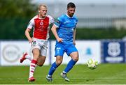 3 August 2025; Padraig Amond of Waterford in action against Tom Grivosti of St Patrick's Athletic during the SSE Airtricity Men's Premier Division match between Waterford and St Patrick's Athletic at Regional Sports Centre in Waterford. Photo by Tyler Miller/Sportsfile
