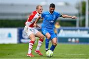 3 August 2025; Padraig Amond of Waterford in action against Tom Grivosti of St Patrick's Athletic during the SSE Airtricity Men's Premier Division match between Waterford and St Patrick's Athletic at Regional Sports Centre in Waterford. Photo by Tyler Miller/Sportsfile