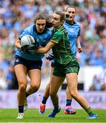 3 August 2025; Éilish O'Dowd of Dublin is tackled by Mary Kate Lynch of Meath during the TG4 All-Ireland Ladies Football Senior Championship final match between Dublin and Meath at Croke Park in Dublin. Photo by Shauna Clinton/Sportsfile