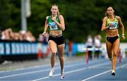 3 August 2025; Ellis McHugh of Ferrybank AC, Waterford, left, competes in the senior women's 400m hurdles final during day two of the 153rd 123.ie National Track & Field Senior Championships at Morton Stadium in Dublin. Photo by Sam Barnes/Sportsfile
