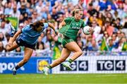 3 August 2025; Vikki Wall of Meath in action against Leah Caffrey of Dublin during the TG4 All-Ireland Ladies Football Senior Championship final match between Dublin and Meath at Croke Park in Dublin. Photo by Piaras Ó Mídheach/Sportsfile