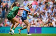 3 August 2025; Nicole Owens of Dublin on her way to scoring her side's first goal despite the efforts of Aoibhín Cleary of Meath during the TG4 All-Ireland Ladies Football Senior Championship final match between Dublin and Meath at Croke Park in Dublin. Photo by Shauna Clinton/Sportsfile