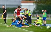 3 August 2025; Mason Melia of St Patrick's Athletic is tackled by Darragh Leahy of Waterford during the SSE Airtricity Men's Premier Division match between Waterford and St Patrick's Athletic at Regional Sports Centre in Waterford. Photo by Tyler Miller/Sportsfile