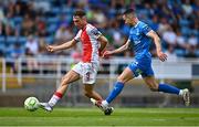 3 August 2025; Mason Melia of St Patrick's Athletic shoots on goal despite the efforts of Darragh Leahy of Waterford during the SSE Airtricity Men's Premier Division match between Waterford and St Patrick's Athletic at Regional Sports Centre in Waterford. Photo by Tyler Miller/Sportsfile