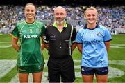 3 August 2025; Referee Gus Chapman, centre, is joined by Meath captain Aoibhín Cleary, left, and Dublin captain Carla Rowe for the coin toss before the TG4 All-Ireland Ladies Football Senior Championship final match between Dublin and Meath at Croke Park in Dublin. Photo by Shauna Clinton/Sportsfile