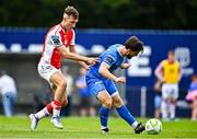 3 August 2025; Ryan Burke of Waterford in action against Mason Melia of St Patrick's Athletic during the SSE Airtricity Men's Premier Division match between Waterford and St Patrick's Athletic at Regional Sports Centre in Waterford. Photo by Tyler Miller/Sportsfile