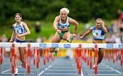 3 August 2025; Sarah Lavin of Emerald AC, Limerick, centre, on her way to winning the senior women's 100m hurdles final  during day two of the 153rd 123.ie National Track & Field Senior Championships at Morton Stadium in Dublin. Photo by Sam Barnes/Sportsfile
