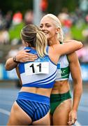 3 August 2025; Sarah Lavin of Emerald AC, Limerick, right, is congratulated by Molly Scott of St Laurence O'Toole AC, Carlow, after winning the senior women's 100m hurdles final during day two of the 153rd 123.ie National Track & Field Senior Championships at Morton Stadium in Dublin. Photo by Sam Barnes/Sportsfile
