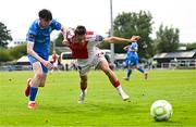 3 August 2025; Axel Sjoberg of St Patrick's Athletic in action against Jesse Dempsey of Waterford during the SSE Airtricity Men's Premier Division match between Waterford and St Patrick's Athletic at Regional Sports Centre in Waterford. Photo by Tyler Miller/Sportsfile