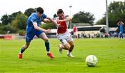 3 August 2025; Axel Sjoberg of St Patrick's Athletic in action against Jesse Dempsey of Waterford during the SSE Airtricity Men's Premier Division match between Waterford and St Patrick's Athletic at Regional Sports Centre in Waterford. Photo by Tyler Miller/Sportsfile