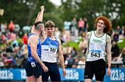 3 August 2025; Adam Nolan of St Laurence O'Toole AC, Carlow, centre, is congratulated by Gerard O'Donnell of Carrick-on-Shannon AC, Leitrim, left, and Conor Penny of Craughwell AC, Galway, right, after winning the senior men's 110m hurdles final during day two of the 153rd 123.ie National Track & Field Senior Championships at Morton Stadium in Dublin. Photo by Sam Barnes/Sportsfile