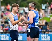 3 August 2025; Adam Nolan of St Laurence O'Toole AC, Carlow, left, is congratulated by Gerard O'Donnell of Carrick-on-Shannon AC, Leitrim, right, after winning the senior men's 110m hurdles final during day two of the 153rd 123.ie National Track & Field Senior Championships at Morton Stadium in Dublin. Photo by Sam Barnes/Sportsfile