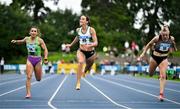 3 August 2025; Ciara Neville of Emerald AC, Limerick, centre, crosses the line to win the senior women's 100m final, ahead of Sarah Leahy of Killarney Valley AC, Kerry, left, and Lauren Roy of Fast Twitch AC, right,  during day two of the 153rd 123.ie National Track & Field Senior Championships at Morton Stadium in Dublin. Photo by Sam Barnes/Sportsfile