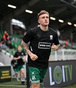 3 August 2025; Danny Grant of Shamrock Rovers runs out to warms up wearing the jersey of Templeogue United’s over 35’s in support of the O’Neill family before the SSE Airtricity Men's Premier Division match between Shamrock Rovers and Derry City at Tallaght Stadium in Dublin.  Photo by Stephen McCarthy/Sportsfile