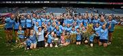 3 August 2025; Dublin players and supporters celebrate with the Brendan Martin cup after their side's victory in the TG4 All-Ireland Ladies Football Senior Championship final match between Dublin and Meath at Croke Park in Dublin. Photo by Seb Daly/Sportsfile