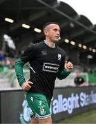 3 August 2025; Aaron McEneff of Shamrock Rovers runs out to warms up wearing the jersey of Templeogue United’s over 35’s in support of the O’Neill family before the SSE Airtricity Men's Premier Division match between Shamrock Rovers and Derry City at Tallaght Stadium in Dublin.  Photo by Stephen McCarthy/Sportsfile