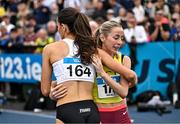 3 August 2025; Alex O'Neill of Limerick Track AC, left, is congratulated by Sarah Healy of UCD AC, Dublin, after winning the senior women's 800m final during day two of the 153rd 123.ie National Track & Field Senior Championships at Morton Stadium in Dublin. Photo by Sam Barnes/Sportsfile