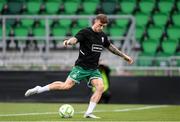 3 August 2025; Danny Grant of Shamrock Rovers warms up wearing the jersey of Templeogue United’s over 35’s in support of the O’Neill family before the SSE Airtricity Men's Premier Division match between Shamrock Rovers and Derry City at Tallaght Stadium in Dublin.  Photo by Stephen McCarthy/Sportsfile