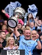 3 August 2025; Dublin captain Carla Rowe lifts the Brendan Martin cup after her side's victory in the TG4 All-Ireland Ladies Football Senior Championship final match between Dublin and Meath at Croke Park in Dublin. Photo by Piaras Ó Mídheach/Sportsfile