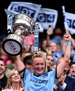 3 August 2025; Dublin captain Carla Rowe lifts the Brendan Martin cup after her side's victory in the TG4 All-Ireland Ladies Football Senior Championship final match between Dublin and Meath at Croke Park in Dublin. Photo by Piaras Ó Mídheach/Sportsfile