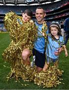 3 August 2025; Dublin joint manager Paul Casey celebrates with his children Luke, age seven, and Lucy, age 4, after his side's victory in the TG4 All-Ireland Ladies Football Senior Championship final match between Dublin and Meath at Croke Park in Dublin. Photo by Seb Daly/Sportsfile