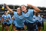 3 August 2025; Dublin players Sinéad Goldrick, left, and Hannah Tyrrell after their side's victory in the TG4 All-Ireland Ladies Football Senior Championship final match between Dublin and Meath at Croke Park in Dublin. Photo by Seb Daly/Sportsfile
