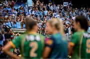 3 August 2025; Meath players, including Áine Sheridan, 2, and Marion Farrelly, 9, look on as Dublin players lifts the cup after the TG4 All-Ireland Ladies Football Senior Championship final match between Dublin and Meath at Croke Park in Dublin. Photo by Shauna Clinton/Sportsfile