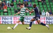 3 August 2025; Dylan Watts of Shamrock Rovers in action against Dipo Akinyemi of Derry City during the SSE Airtricity Men's Premier Division match between Shamrock Rovers and Derry City at Tallaght Stadium in Dublin.  Photo by Ben McShane/Sportsfile