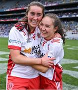 3 August 2025; Laois players Chloe McCaffrey, left, and Gráinne McKenna celebrate after the TG4 All-Ireland Ladies Football Intermediate Championship final match between Laois and Tyrone at Croke Park in Dublin. Photo by Shauna Clinton/Sportsfile
