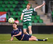 3 August 2025; Rory Gaffney of Shamrock Rovers shoots to score his side's second goal despite the attention of Alex Bannon of Derry City during the SSE Airtricity Men's Premier Division match between Shamrock Rovers and Derry City at Tallaght Stadium in Dublin.  Photo by Stephen McCarthy/Sportsfile