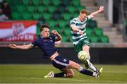3 August 2025; Rory Gaffney of Shamrock Rovers shoots to score his side's second goal despite the attention of Alex Bannon of Derry City during the SSE Airtricity Men's Premier Division match between Shamrock Rovers and Derry City at Tallaght Stadium in Dublin.  Photo by Stephen McCarthy/Sportsfile