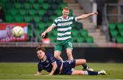 3 August 2025; Rory Gaffney of Shamrock Rovers shoots to score his side's second goal despite the attention of Alex Bannon of Derry City during the SSE Airtricity Men's Premier Division match between Shamrock Rovers and Derry City at Tallaght Stadium in Dublin.  Photo by Stephen McCarthy/Sportsfile