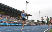 3 August 2025; Andrew Coscoran of Star of the Sea AC, Meath, left, crosses the line to win the senior men's 5000m during day two of the 153rd 123.ie National Track & Field Senior Championships at Morton Stadium in Dublin. Photo by Sam Barnes/Sportsfile