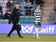 3 August 2025; Danny Grant of Shamrock Rovers leaves the pitch with physiotherapist Tony McCarthy during the SSE Airtricity Men's Premier Division match between Shamrock Rovers and Derry City at Tallaght Stadium in Dublin.  Photo by Stephen McCarthy/Sportsfile