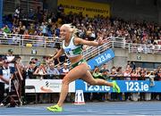 3 August 2025; Sarah Lavin of Emerald AC, Limerick, crosses the line to win the senior women's 100m hurdles final during day two of the 153rd 123.ie National Track & Field Senior Championships at Morton Stadium in Dublin. Photo by Sam Barnes/Sportsfile