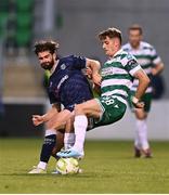 3 August 2025; John McGovern of Shamrock Rovers in action against Brandon Fleming of Derry City during the SSE Airtricity Men's Premier Division match between Shamrock Rovers and Derry City at Tallaght Stadium in Dublin.  Photo by Ben McShane/Sportsfile