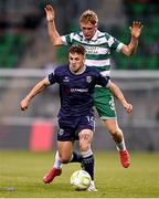 3 August 2025; Ben Doherty of Derry City in action against Michael Noonan of Shamrock Rovers during the SSE Airtricity Men's Premier Division match between Shamrock Rovers and Derry City at Tallaght Stadium in Dublin.  Photo by Ben McShane/Sportsfile