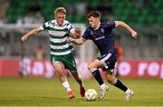 3 August 2025; Ben Doherty of Derry City in action against Michael Noonan of Shamrock Rovers during the SSE Airtricity Men's Premier Division match between Shamrock Rovers and Derry City at Tallaght Stadium in Dublin.  Photo by Ben McShane/Sportsfile
