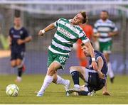 3 August 2025; John McGovern of Shamrock Rovers in action against Ben Doherty of Derry City during the SSE Airtricity Men's Premier Division match between Shamrock Rovers and Derry City at Tallaght Stadium in Dublin.  Photo by Stephen McCarthy/Sportsfile