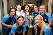 4 August 2025; TG4 All-Ireland Ladies Senior Football Champions Dublin pictured with the Brendan Martin Cup and Saoirse Fearon, aged 4, from Kells, Meath, and her mother Laura Fearon, during a visit by the players to Children's Health Ireland at Crumlin, Dublin. Photo by Sam Barnes/Sportsfile
