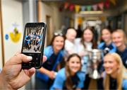 4 August 2025; TG4 All-Ireland Ladies Senior Football Champions Dublin pictured with the Brendan Martin Cup and Saoirse Fearon, aged 4, from Kells, Meath, and her mother Laura Fearon, during a visit by the players to Children's Health Ireland at Crumlin, Dublin. Photo by Sam Barnes/Sportsfile