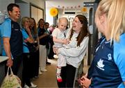 4 August 2025; TG4 All-Ireland Ladies Senior Football Champions Dublin pictured with Saoirse Fearon, aged 4, from Kells, Meath, and her mother Laura Fearon, during a visit by the players to Children's Health Ireland at Crumlin, Dublin. Photo by Sam Barnes/Sportsfile