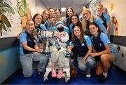 4 August 2025; TG4 All-Ireland Ladies Senior Football Champions Dublin pictured with the Brendan Martin Cup and Fiadh Ní Cheallaigh and her mother Alison, from Limerick, during a visit by the players to Children's Health Ireland at Crumlin, Dublin. Photo by Sam Barnes/Sportsfile
