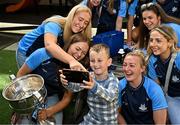 4 August 2025; TG4 All-Ireland Ladies Senior Football Champions Dublin pictured with the Brendan Martin Cup and Shane Comford, aged 7, from Lucan, Dublin, during a visit by the players to Children's Health Ireland at Crumlin, Dublin. Photo by Sam Barnes/Sportsfile