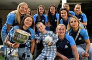 4 August 2025; TG4 All-Ireland Ladies Senior Football Champions Dublin pictured with the Brendan Martin Cup and Shane Comford, aged 7, from Lucan, Dublin, during a visit by the players to Children's Health Ireland at Crumlin, Dublin. Photo by Sam Barnes/Sportsfile