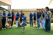 4 August 2025; TG4 All-Ireland Ladies Senior Football Champions Dublin pictured with the Brendan Martin Cup and Dawson Conlon, aged 10, Ballyfermot, during a visit by the players to Children's Health Ireland at Crumlin, Dublin. Photo by Sam Barnes/Sportsfile