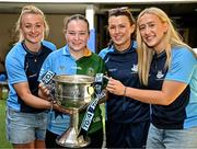 4 August 2025; TG4 All-Ireland Ladies Senior Football Champions Dublin footballers Carlow Rowe, Leah Caffrey and Jodi Egan, pictured with the Brendan Martin Cup and Amy Scanlon, aged 16, from Cabra, Dublin during a visit by the players to Children's Health Ireland at Crumlin, Dublin. Photo by Sam Barnes/Sportsfile