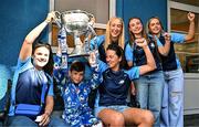 4 August 2025; TG4 All-Ireland Ladies Senior Football Champions Dublin pictured with the Brendan Martin Cup and Dawson Conlon, aged 10, from Ballyfermot in Dublin, during a visit by the players to Children's Health Ireland at Crumlin, Dublin. Photo by Sam Barnes/Sportsfile