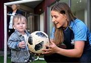 4 August 2025; TG4 All-Ireland Ladies Senior Football Champions Dublin footballer Aoife Curran pictured with Aoife Smith, aged 17 months, from Cavan, during a visit by the players to Children's Health Ireland at Crumlin, Dublin. Photo by Sam Barnes/Sportsfile